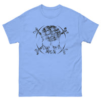 A carolina blue t-shirt adorned with a roughly cross-hatched skull and crossbones in black. Solid black arcs give the image the impression of movement towards the end of the crossbones.