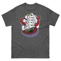 A dark grey t-shirt with an old-school clipper ship tattoo design in green and brown with white sails surrounded by octopus tentacles in shades of red with purple tentacles. Behind the ship are purple-tinged clouds.