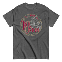 A dark grey t-shirt adorned with the Ink Union Tattoo Co. red and gold with a silver tattoo machine logo.