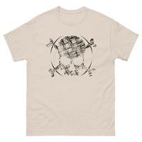 A beige t-shirt adorned with a roughly cross-hatched skull and crossbones in black. Solid black arcs give the image the impression of movement towards the end of the crossbones.