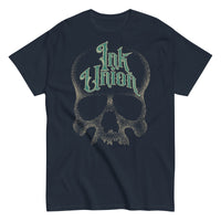 A navy blue t-shirt  adorned with a gold dot work human skull and the words Ink Union in fancy gold and green lettering across the forehead of the skull.