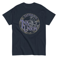 A navy-blue t-shirt adorned with the Ink Union Tattoo Co. blue and gold with a silver tattoo machine logo.