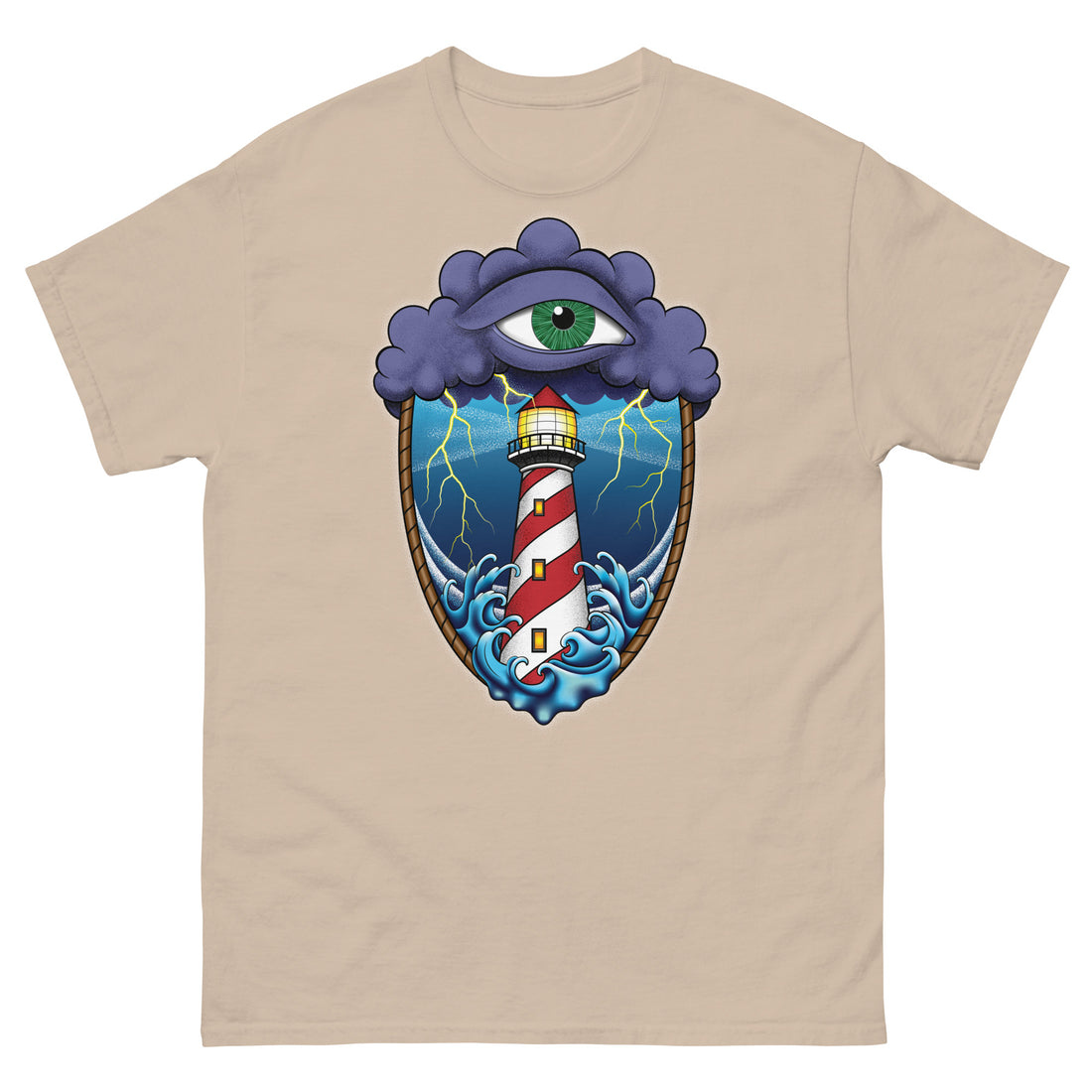 A sand brown t-shirt with an old school eye of the storm tattoo design of large dark purple storm clouds at the top of the design with a green eye in the middle of the clouds.  Below the clouds is an oval shape with brown rope. Inside the rope are stormy seas and a lighthouse with lightning striking in the background.  At the bottom of the design, some of the waves are spilling out of the rope barrier. The sky and seas are hues of blue; the lighthouse is white and red striped like a barber pole.
