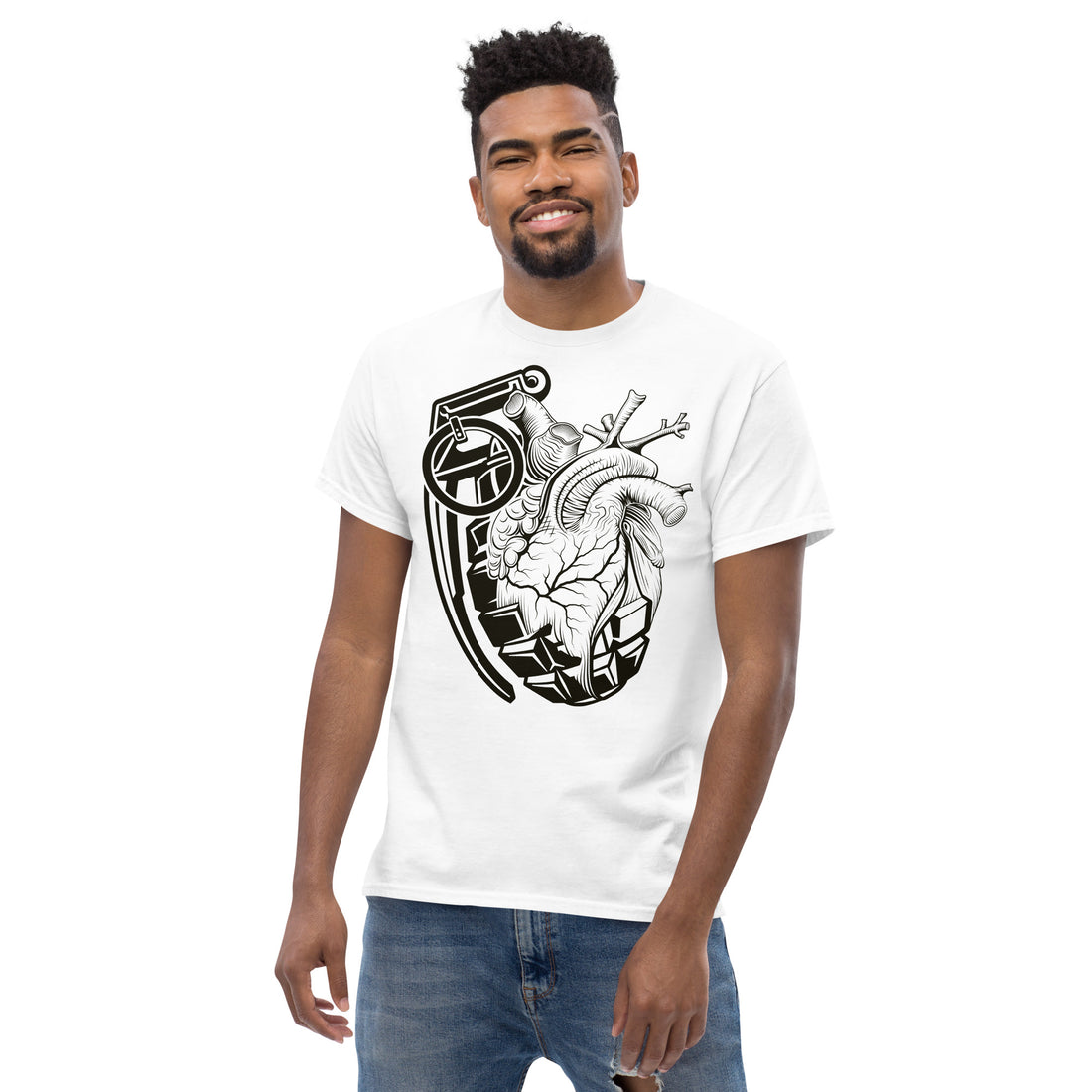 An attractive man is wearing a white t-shirt with a black crescent moon and stars with an ornate moth in front of the bottom of the moon facing upward.