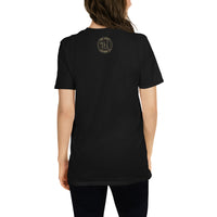 The rear view of an attractive woman wearing a black t-shirt with a small gold Ink Union Clothing Co. logo positioned just below the collar.