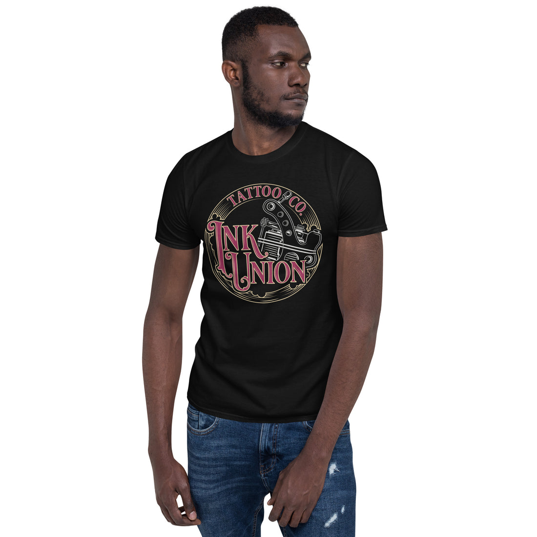 An attractive man wearing a black t-shirt adorned with the Ink Union Tattoo Co. red and gold with a silver tattoo machine logo.