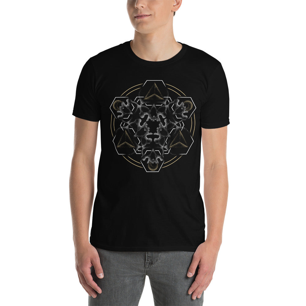 A man wearing a black t-shirt with a mandala built from white dot work skulls and gold and white geometric shapes.