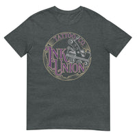A dark grey t-shirt adorned with the Ink Union Tattoo Co. purple and gold with a silver tattoo machine logo.