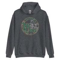 A dark grey  hoodie with a gold circle containing fancy lettering in green and gold that says Ink Union and a gold tattoo machine peeking out from behind on the right side.  There is a dot work gradient inside the circle, and the words Tattoo Co. in gold are at the bottom of the design.