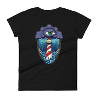 A black t-shirt with an old school eye of the storm tattoo design of large dark purple storm clouds at the top of the design with a green eye in the middle of the clouds.  Below the clouds is an oval shape with brown rope. Inside the rope are stormy seas and a lighthouse with lightning striking in the background.  At the bottom of the design, some of the waves are spilling out of the rope barrier. The sky and seas are hues of blue; the lighthouse is white and red striped like a barber pole.