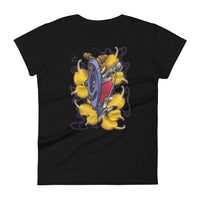 A black t-shirt with a bed of yellow ginkgo leaves and a blue tattoo machine popping out of the leaves. There is a purple mist in the background.