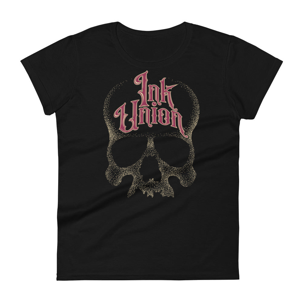 A black t-shirt with a gold dot work human skull and the words Ink Union in fancy gold and red lettering across the forehead of the skull.