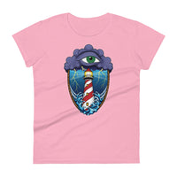 A pink t-shirt with an old school eye of the storm tattoo design of large dark purple storm clouds at the top of the design with a green eye in the middle of the clouds.  Below the clouds is an oval shape with brown rope. Inside the rope are stormy seas and a lighthouse with lightning striking in the background.  At the bottom of the design, some of the waves are spilling out of the rope barrier. The sky and seas are hues of blue; the lighthouse is white and red striped like a barber pole.