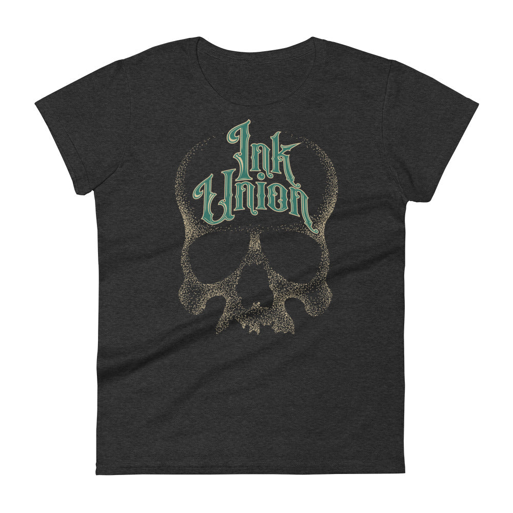 A dark grey t-shirt adorned with a gold dot work human skull  and the words Ink Union in fancy gold and green lettering across the forehead of the skull.