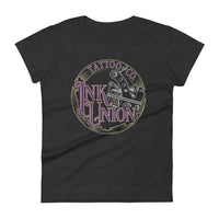 A dark grey t-shirt adorned with the Ink Union Tattoo Co. purple and gold with a silver tattoo machine logo.