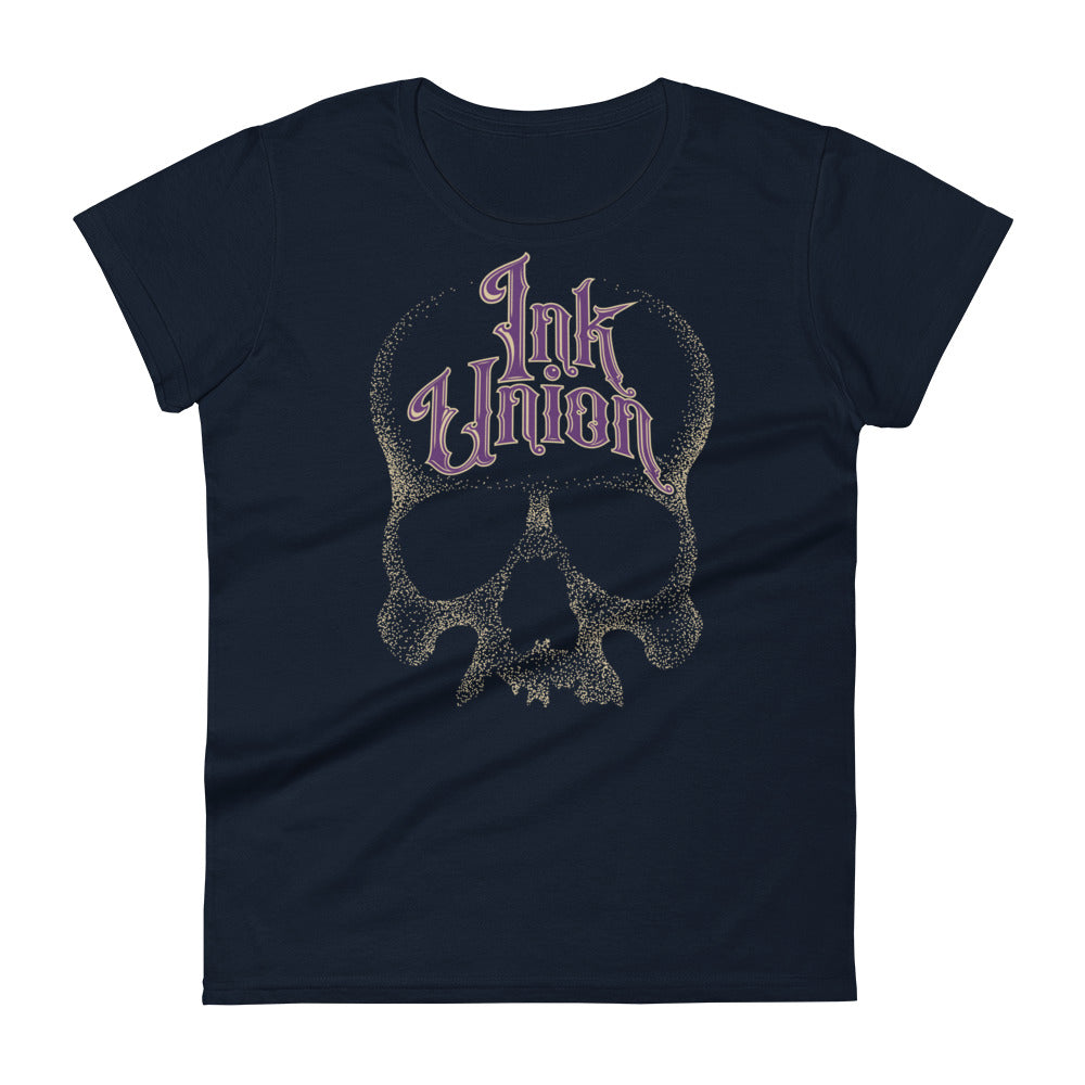 A navy t-shirt with a gold dot work human skull and the words Ink Union in fancy gold and purple lettering across the forehead of the skull.
