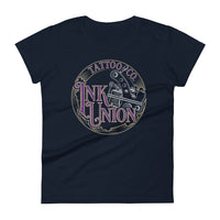 A navy-blue t-shirt adorned with the Ink Union Tattoo Co. purple and gold with a silver tattoo machine logo.