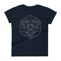 A navy t-shirt with a mandala built from white dot work skulls and gold and white geometric shapes.