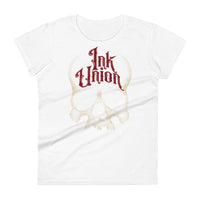 A white t-shirt adorned with a gold dot work human skull  and the words Ink Union in fancy gold and red lettering across the forehead of the skull.
