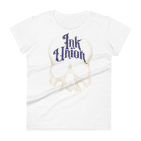 A white t-shirt adorned with a gold dot work human skull  and the words Ink Union in fancy gold and blue lettering across the forehead of the skull.