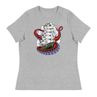 A light grey t-shirt with an old-school clipper ship tattoo design in green and brown with white sails surrounded by octopus tentacles in shades of red with purple tentacles. Behind the ship are purple-tinged clouds.