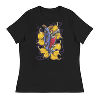 A black t-shirt with a bed of yellow ginkgo leaves and a blue tattoo machine popping out of the leaves. There is a purple mist in the background.