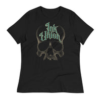 A black t-shirt  adorned with a gold dot work human skull and the words Ink Union in fancy gold and green lettering across the forehead of the skull.