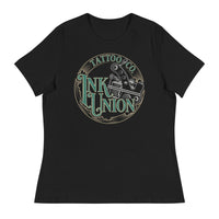 A black t-shirt adorned with the Ink Union Tattoo Co. green and gold with a Silver tattoo machine logo.