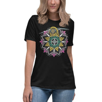 A woman wearing a black t-shirt with a mandala containing pink lotus flowers and honeycomb designs and a life-like honeybee flying toward you at the top of the mandala.