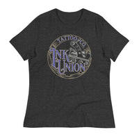 A dark grey t-shirt adorned with the Ink Union Tattoo Co. blue and gold with a silver tattoo machine logo.