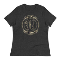 A dark grey t-shirt adorned with the Ink Union Clothing Co gold badge logo containing fancy lettering and dot work gradients.