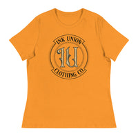 A yellow t-shirt with the Ink Union Clothing Co Badge logo in black and gold centered on the front of the shirt.