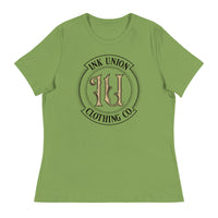 A leaf green t-shirt with the Ink Union Clothing Co Badge logo in black and gold centered on the front of the shirt.