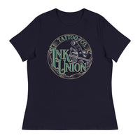 A navy blue t-shirt adorned with the Ink Union Tattoo Co. green and gold with a Silver tattoo machine logo.