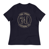 A navy blue t-shirt adorned with the Ink Union Clothing Co gold badge logo containing fancy lettering and dot work gradients.