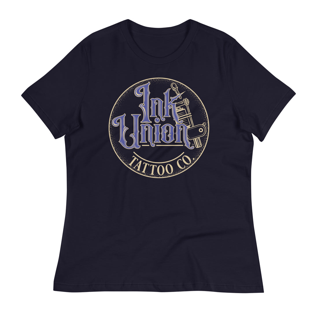 A navy blue t-shirt with a gold circle containing fancy lettering in blue and gold that says Ink Union and a gold tattoo machine peeking out from behind on the right side.  There is a dot work gradient inside the circle, and the words Tattoo Co. in gold are at the bottom of the design.