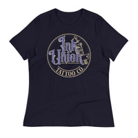 A navy blue t-shirt with a gold circle containing fancy lettering in blue and gold that says Ink Union and a gold tattoo machine peeking out from behind on the right side.  There is a dot work gradient inside the circle, and the words Tattoo Co. in gold are at the bottom of the design.