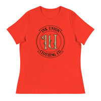 A poppy red t-shirt with the Ink Union Clothing Co Badge logo in black and gold centered on the front of the shirt.