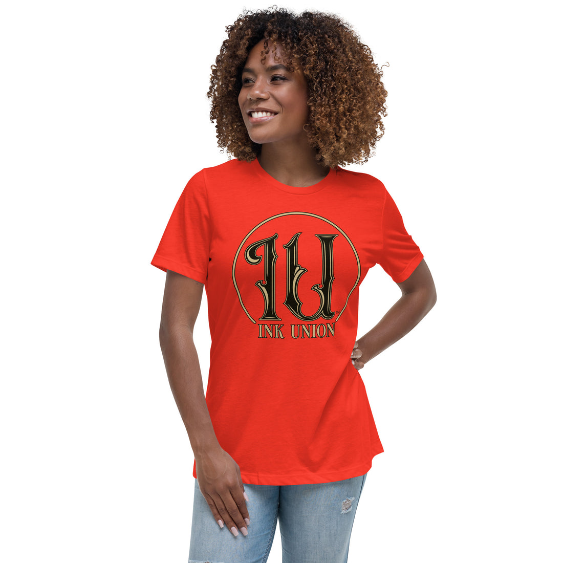 An attractive woman wearing an Ink Union Clothing Co. poppy red t-shirt featuring the Ink Union ring logo in black and gold.