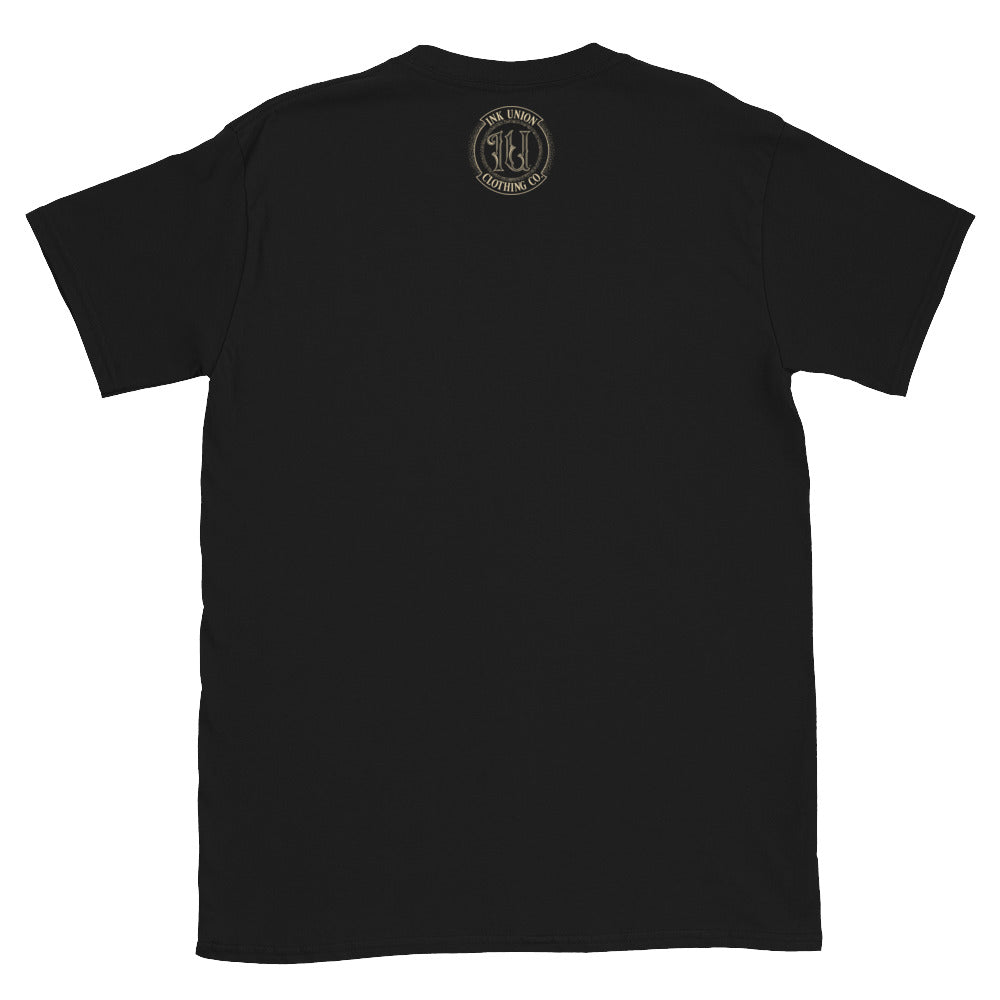 back of a black t-shirt with the ink union clothing co. gold badge logo at three inches big positioned just below the collar