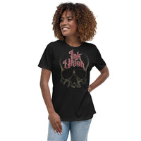 woman wearing an Ink Union Clothing Co. women's relaxed fit black t-shirt  featuring a large dot work gold skull centered on the shirt and Ink Union in large fancy gold and red script across the forehead of the skull