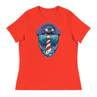 A poppy red t-shirt with an old school eye of the storm tattoo design of large dark purple storm clouds at the top of the design with a green eye in the middle of the clouds.  Below the clouds is an oval shape with brown rope. Inside the rope are stormy seas and lightning striking at a lighthouse that is white and red striped like a barber pole.