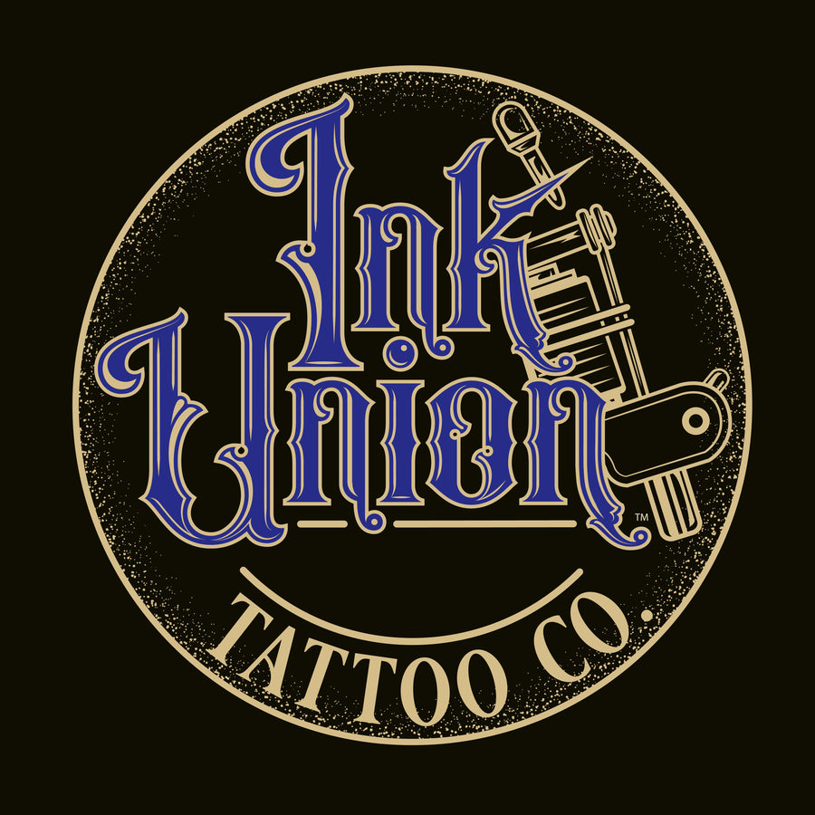 A black background with a gold circle containing fancy lettering in blue and gold that says Ink Union and a gold tattoo machine peeking out from behind on the right side.  There is a dot work gradient inside the circle, and the words Tattoo Co. in gold are at the bottom of the design.