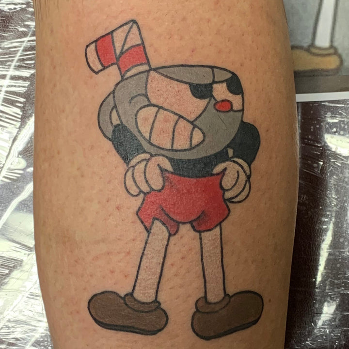 color tattoo of cuphead a character from the videogame cuphead