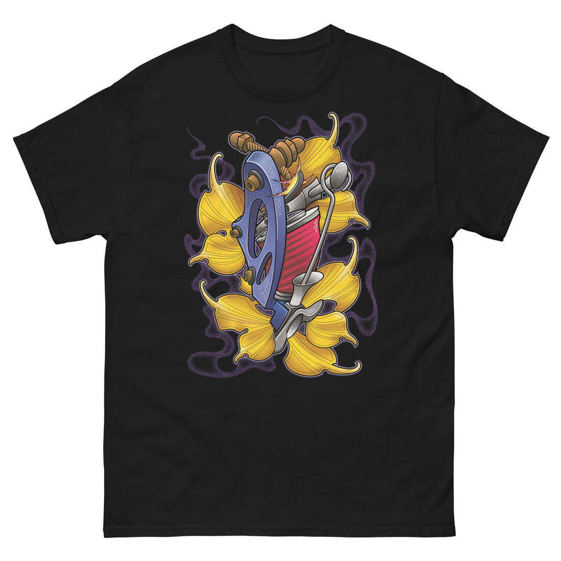 A black t-shirt with a bed of yellow ginkgo leaves and a blue tattoo machine popping out of the leaves. There is a purple mist in the background.