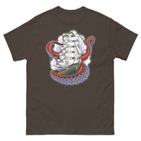 A Chocolate t-shirt with an old-school clipper ship tattoo design in green and brown with white sails surrounded by octopus tentacles in shades of red with purple tentacles. Behind the ship are purple-tinged clouds.