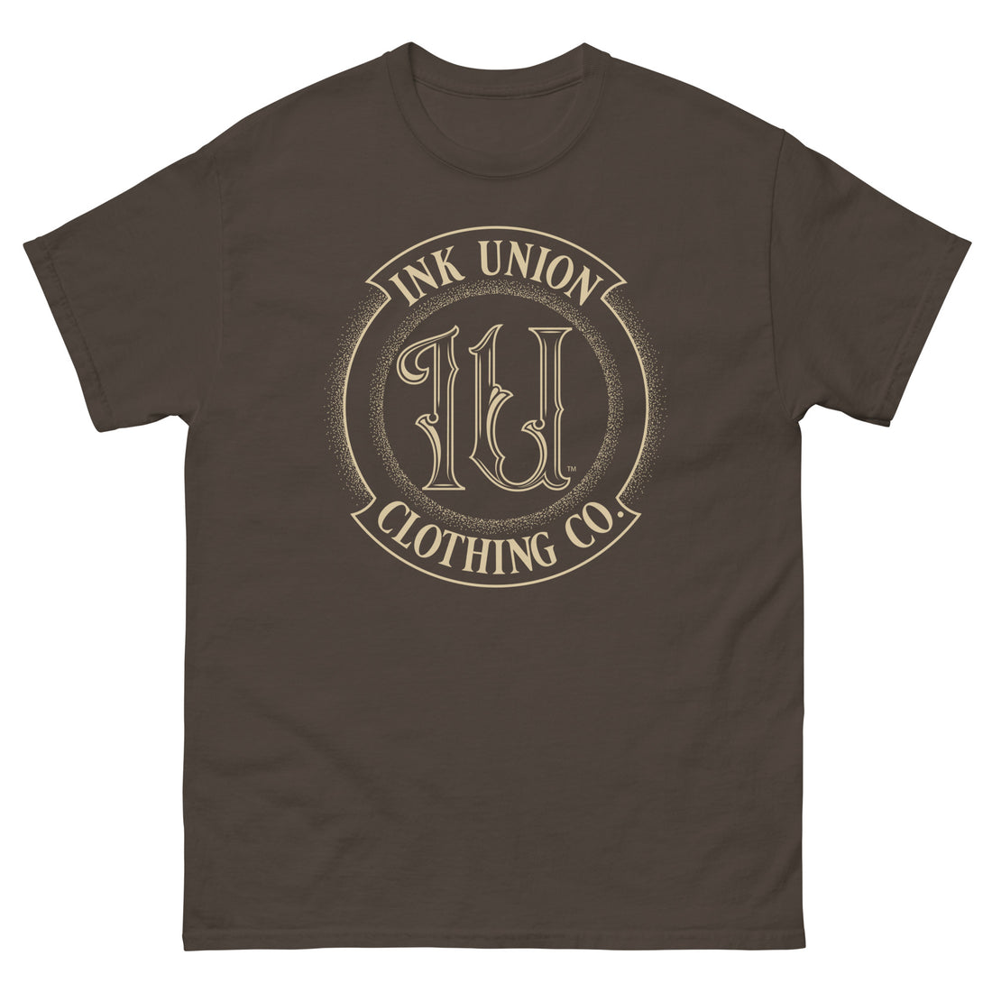 A brown t-shirt adorned with the Ink Union Clothing Co gold badge logo containing fancy lettering and dot work gradients.