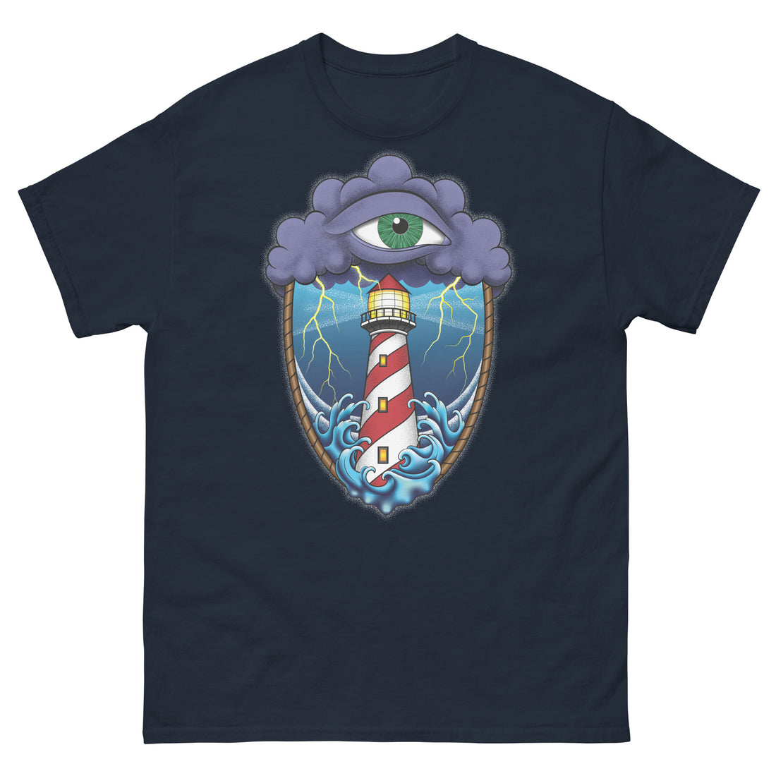 A Navy blue t-shirt with an old school eye of the storm tattoo design of large dark purple storm clouds at the top of the design with a green eye in the middle of the clouds.  Below the clouds is an oval shape with brown rope. Inside the rope are stormy seas and a lighthouse with lightning striking in the background.  At the bottom of the design, some of the waves are spilling out of the rope barrier. The sky and seas are hues of blue; the lighthouse is white and red striped like a barber pole.