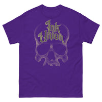 A purple t-shirt with a gold dot work human skull and the words Ink Union in fancy gold and black lettering across the forehead of the skull.