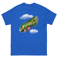 A royal blue t-shirt with a military green neo-traditional bomb tattoo design. The bomb is falling with a look of determination in its eyes, an evil toothy grin, and its tongue hanging out of its mouth. Flames are coming from the back of the bomb, and some clouds are in the background.